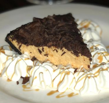 Chocolate peanut butter cake slice
